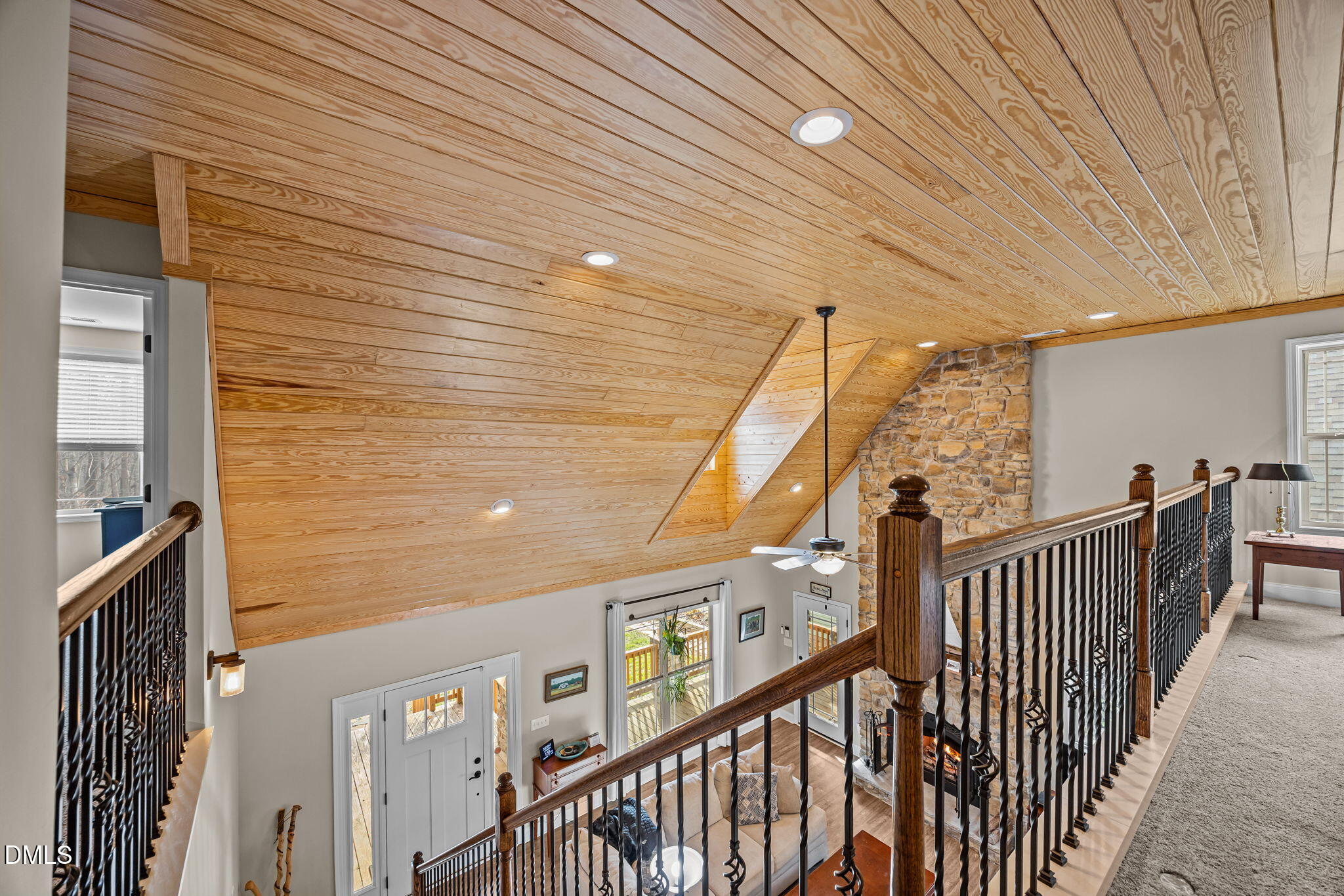3225 Back Acres Road Efland, NC 27243 - Photo 26 of 57 a view of staircase with railing and white walls