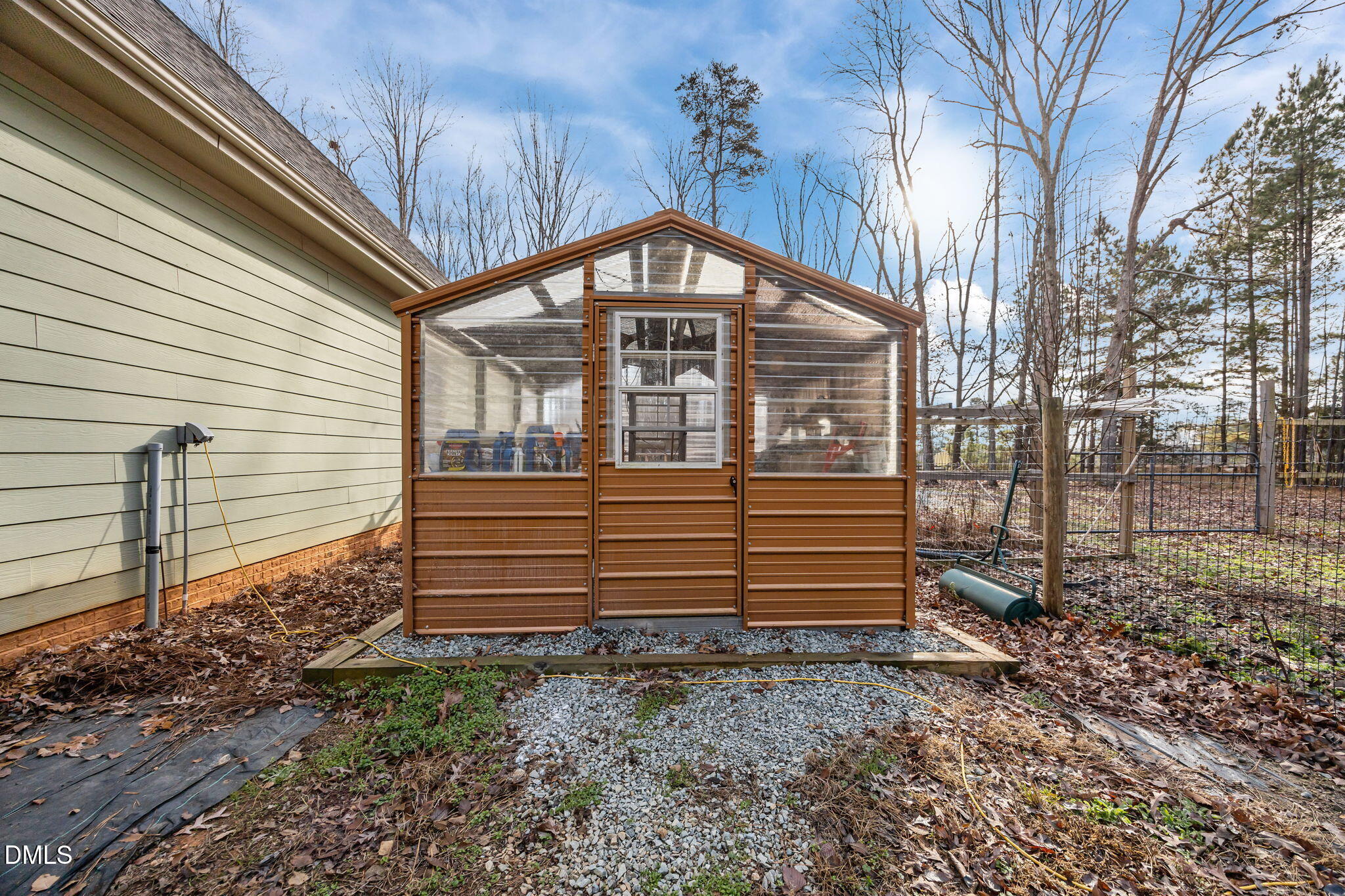 3225 Back Acres Road Efland, NC 27243 - Photo 37 of 57 a view of a house with a yard