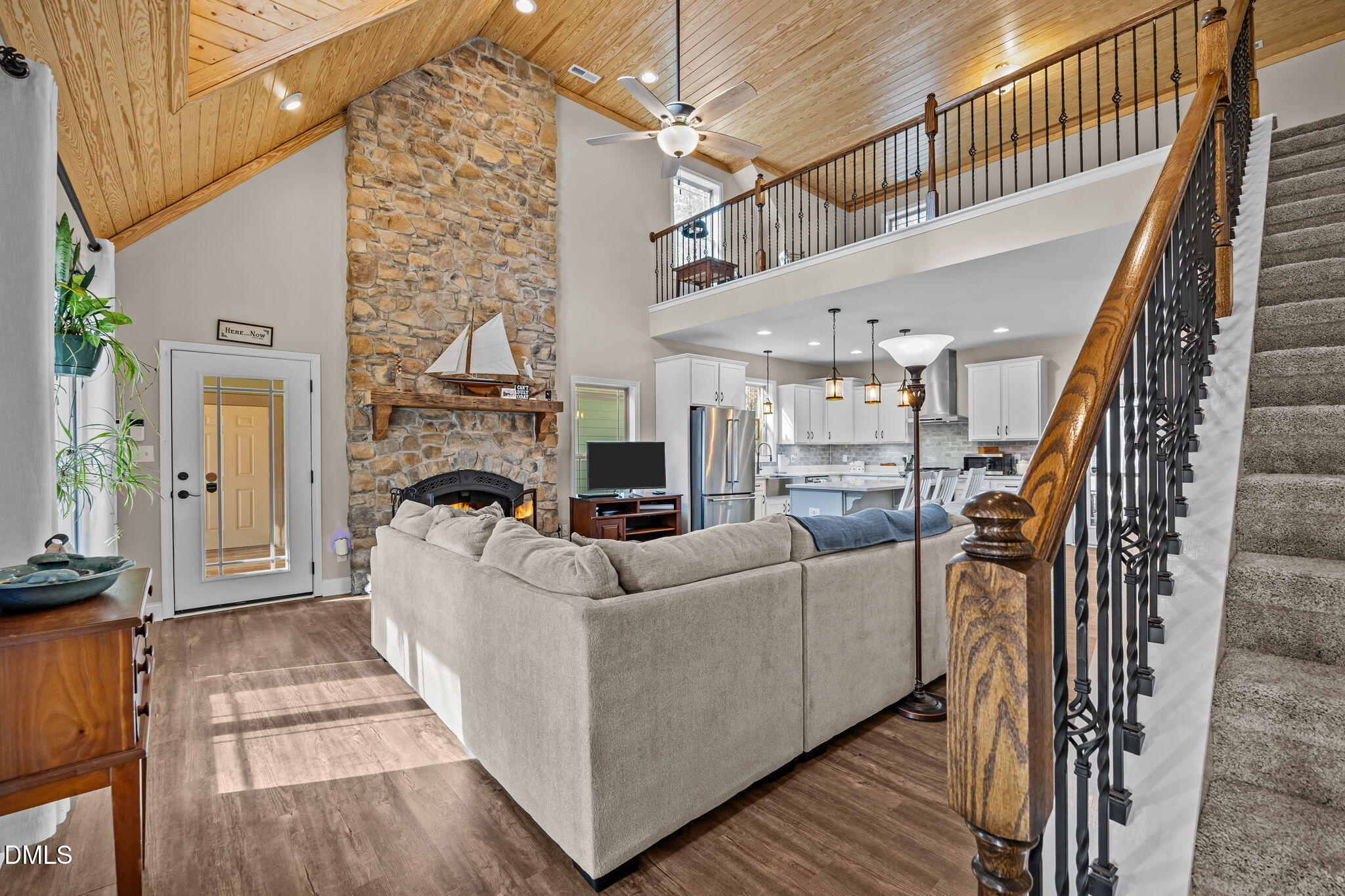 3225 Back Acres Road Efland, NC 27243 - Photo 3 of 57 a living room with furniture and a fireplace