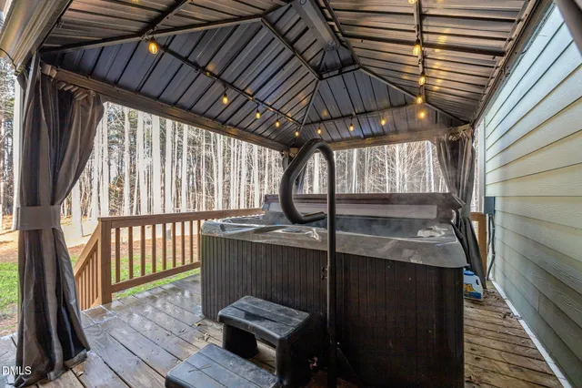 a view of a house with swimming pool and a yard