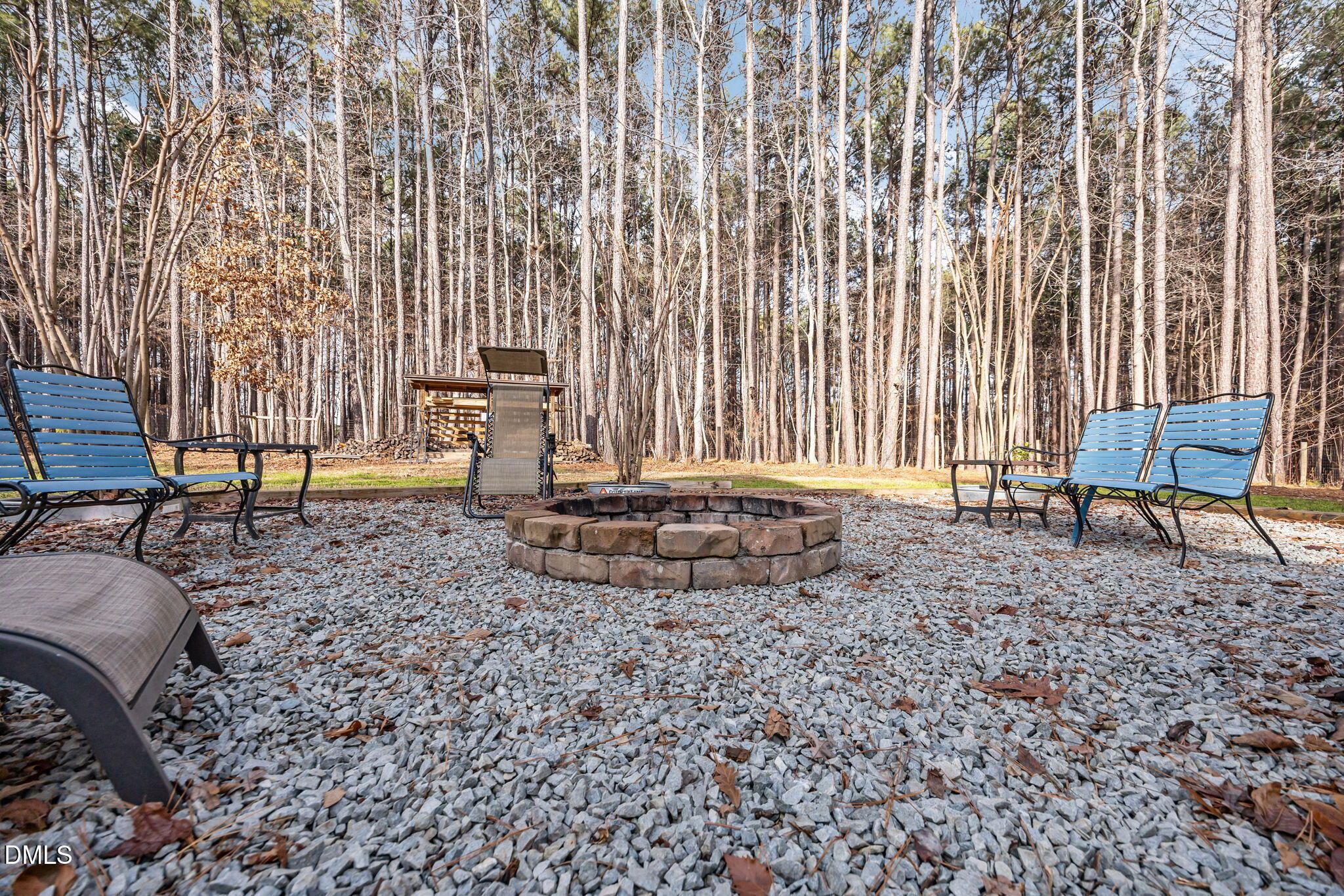 3225 Back Acres Road Efland, NC 27243 - Photo 42 of 57 a view of a backyard with furniture