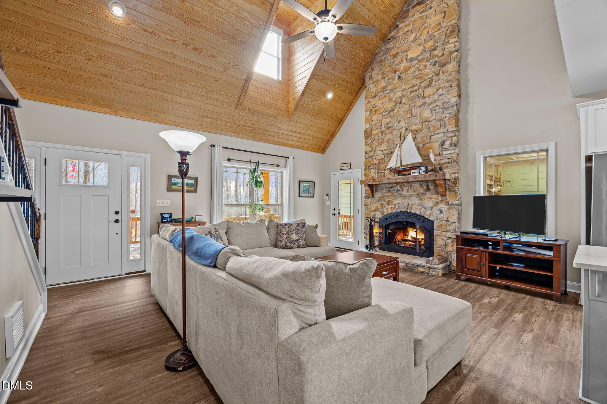 3225 Back Acres Road Efland, NC 27243 - Photo 5 of 57 a living room with furniture and a fireplace