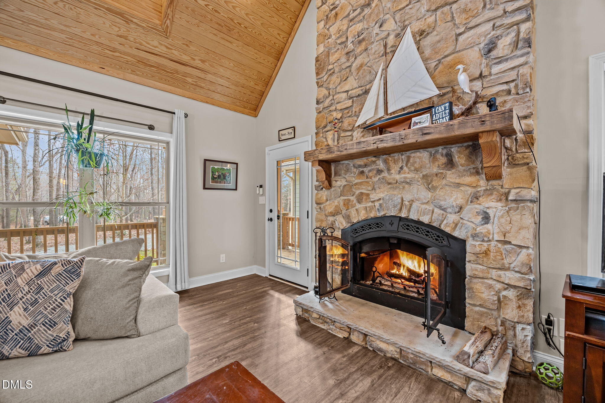 3225 Back Acres Road Efland, NC 27243 - Photo 6 of 57 a living room with furniture and a fireplace
