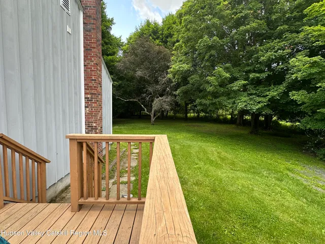 a view of swimming pool with seating space