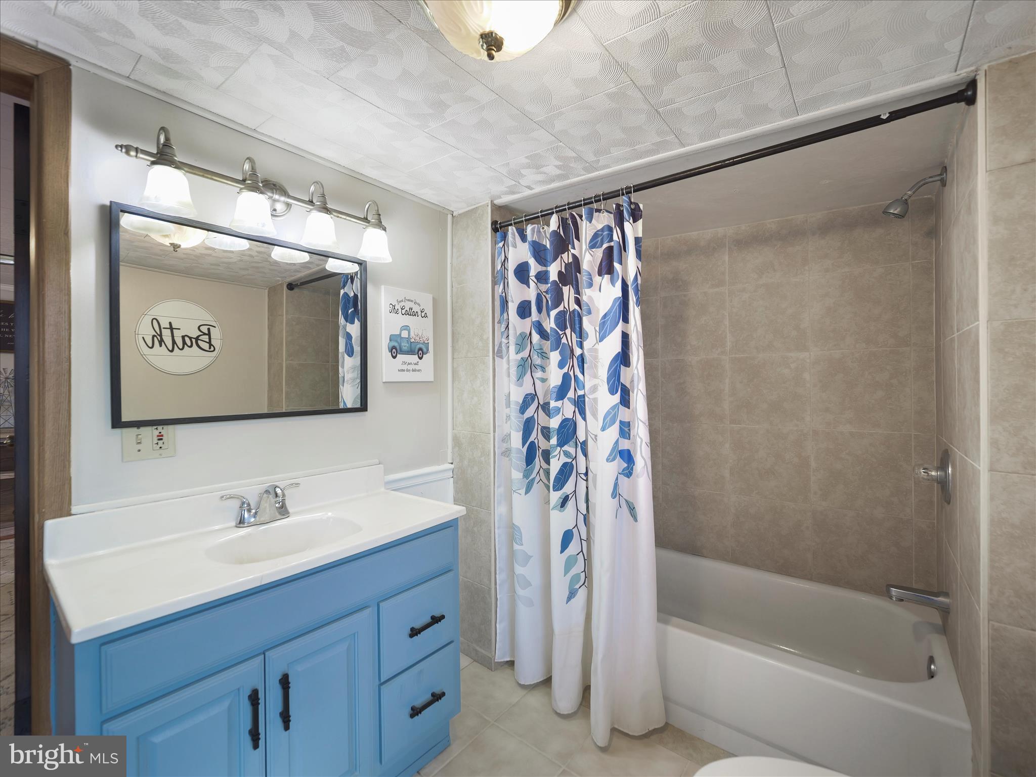 14628 Hollow Road Hancock, MD 21750 - Photo 23 of 54 a bathroom with a sink and a mirror