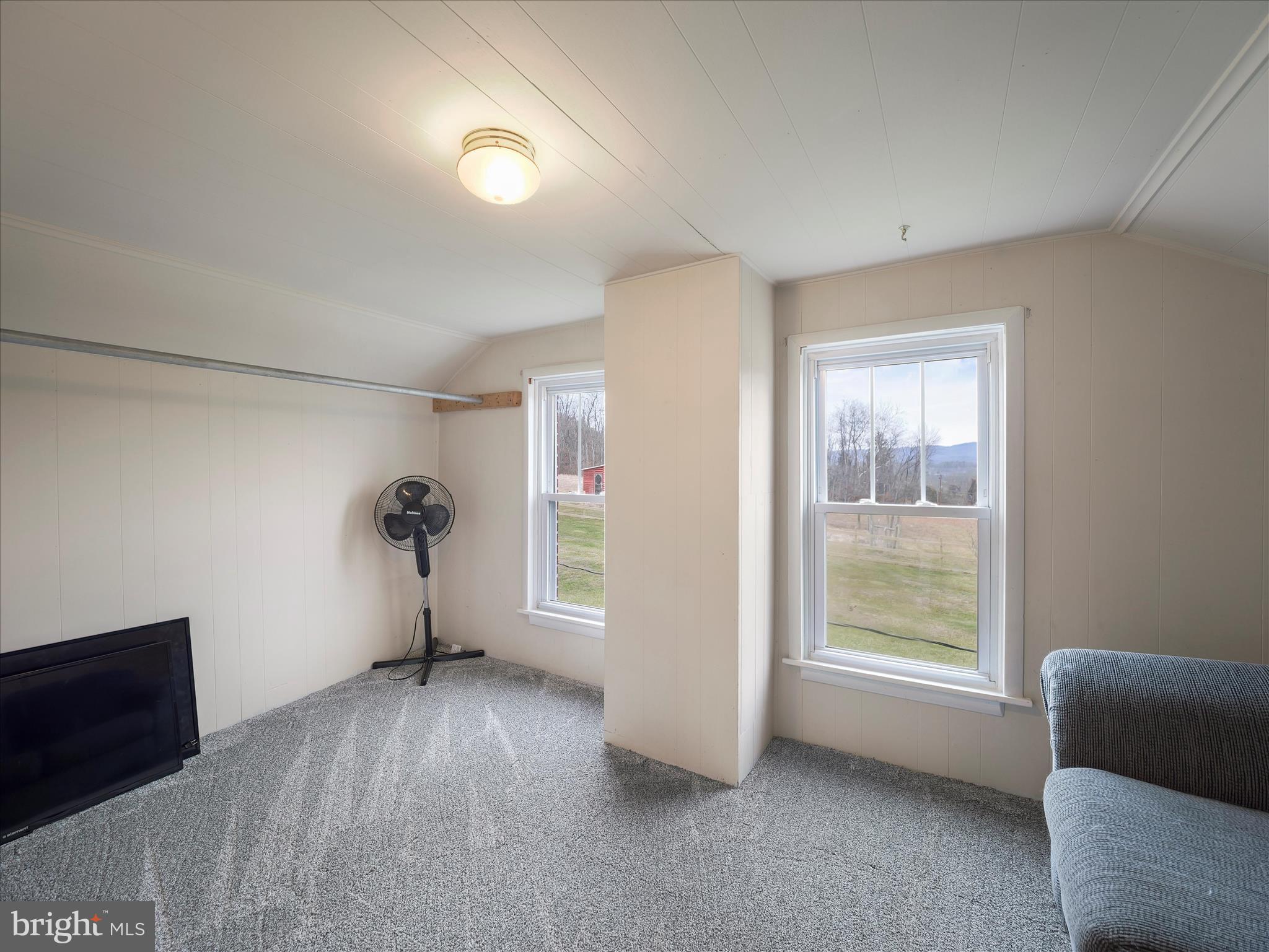 14628 Hollow Road Hancock, MD 21750 - Photo 32 of 54 an empty room with windows and closet