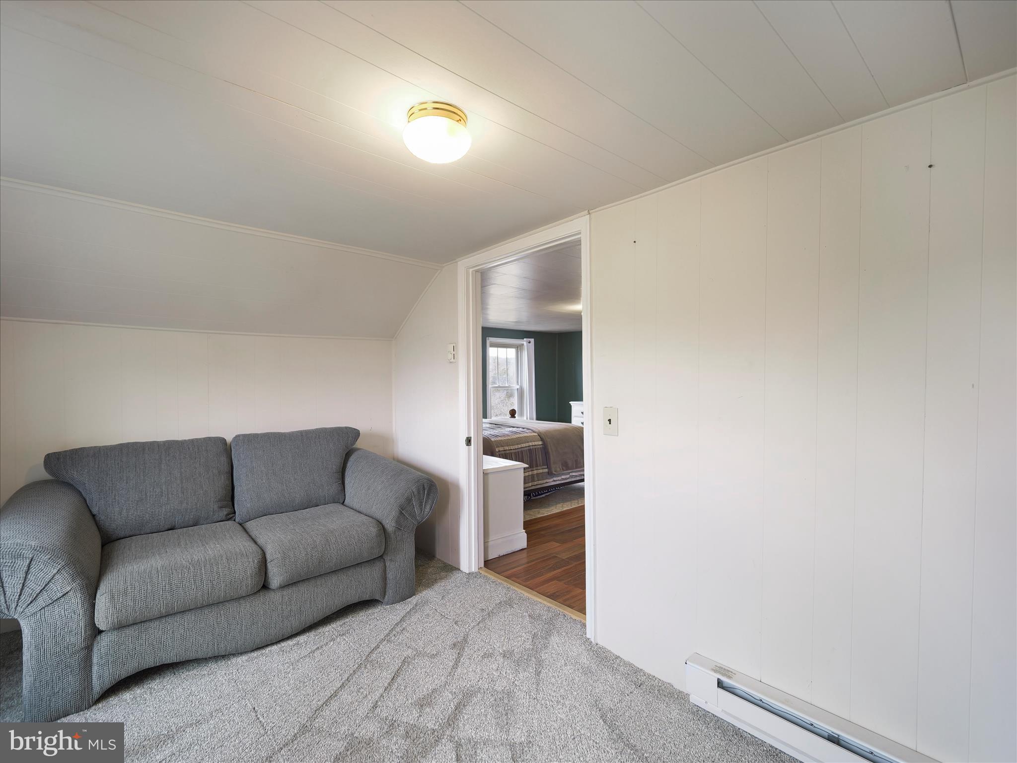 14628 Hollow Road Hancock, MD 21750 - Photo 33 of 54 a living room with furniture and white walls