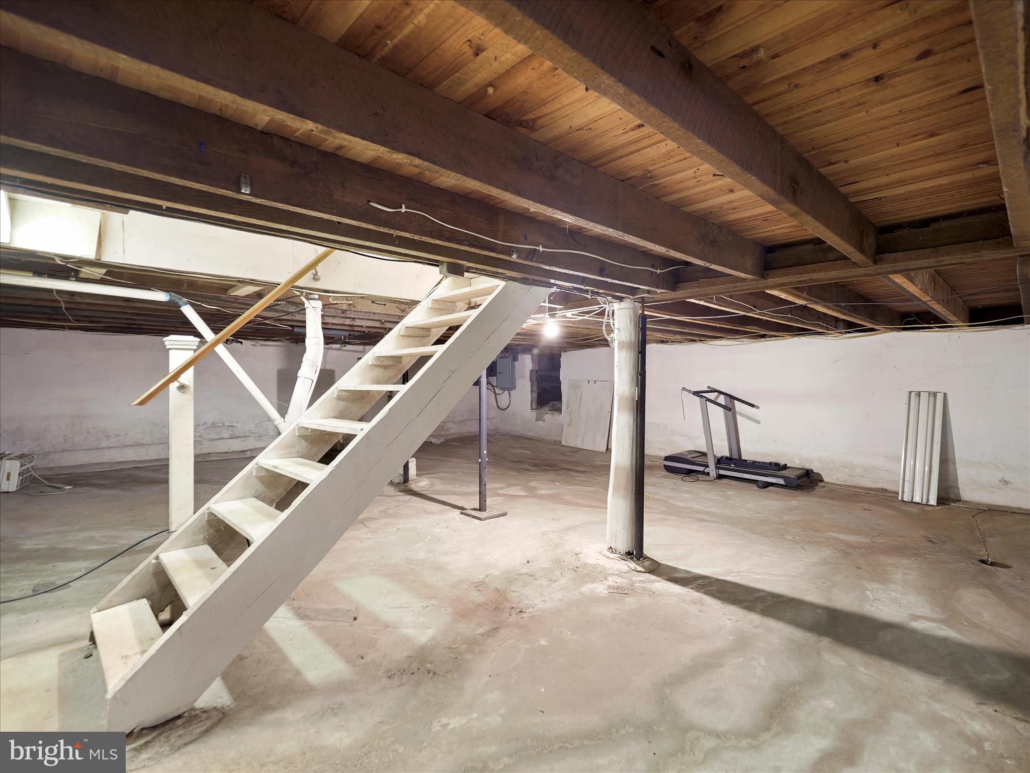 14628 Hollow Road Hancock, MD 21750 - Photo 34 of 54 a view of an empty room with wooden floor