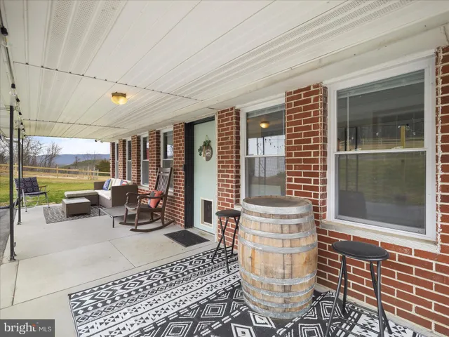 a aerial view of a house with a swimming pool
