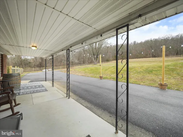 an aerial view of house with yard