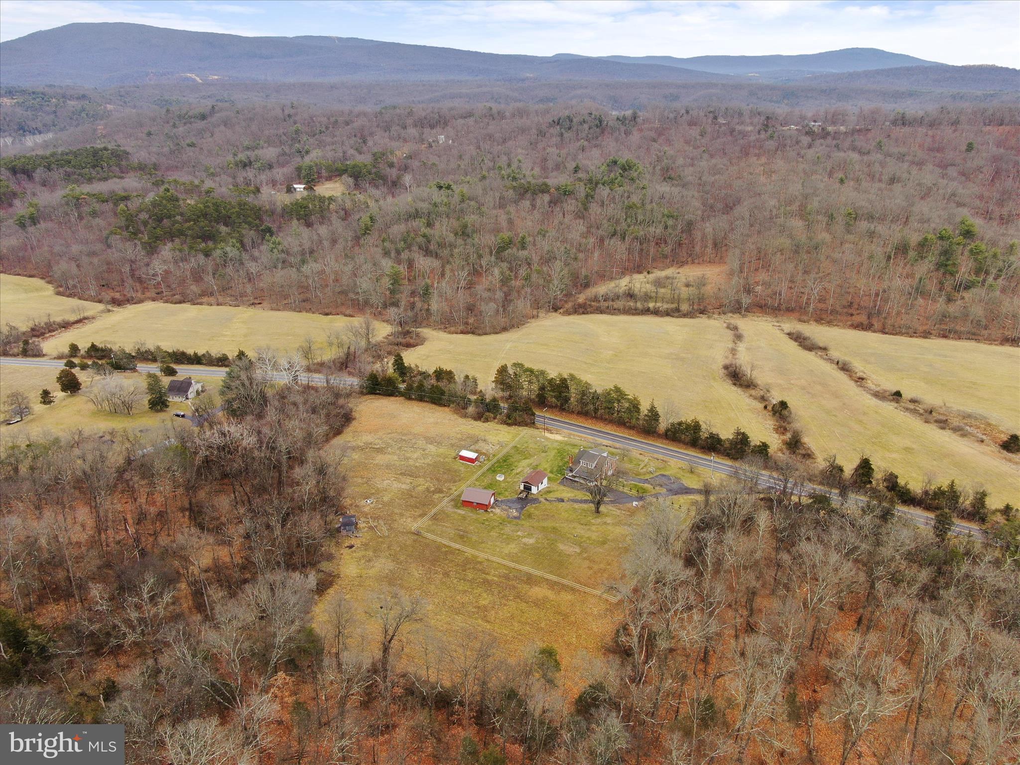 14628 Hollow Road Hancock, MD 21750 - Photo 49 of 54 a view of a yard with mountains in the background