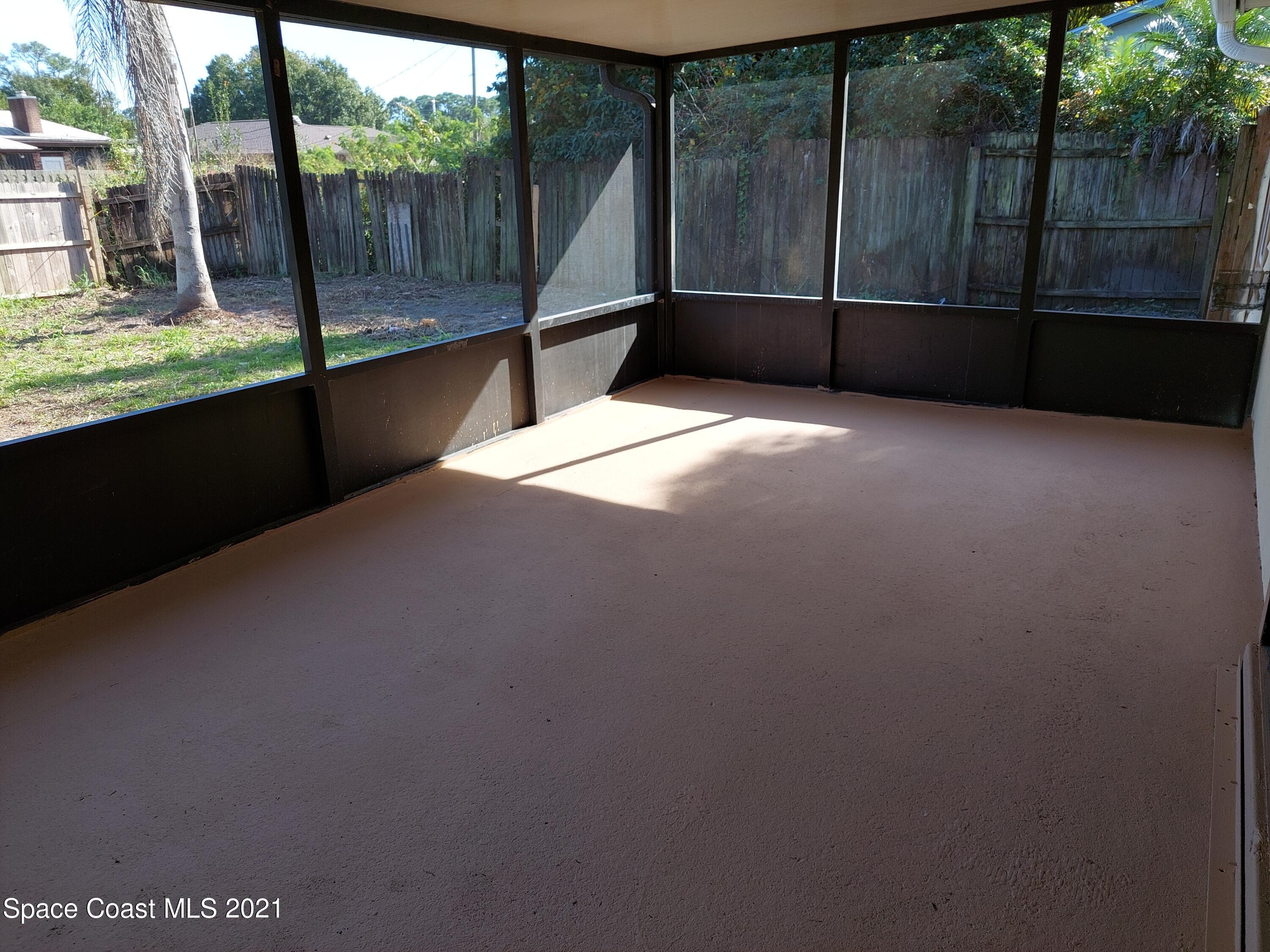 631 Furth Road Northwest Palm Bay, FL 32907 - Photo 41 of 42 a view of backyard with green space