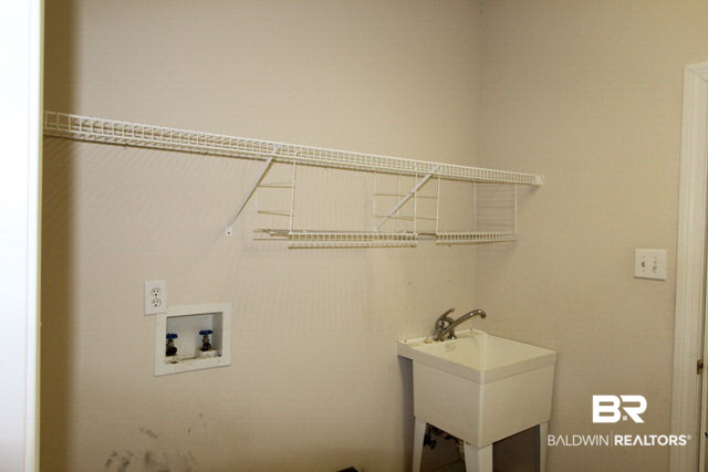 128 Wedge Loop Fairhope, AL 36532 - Photo 21 of 35 Laundry with Sink