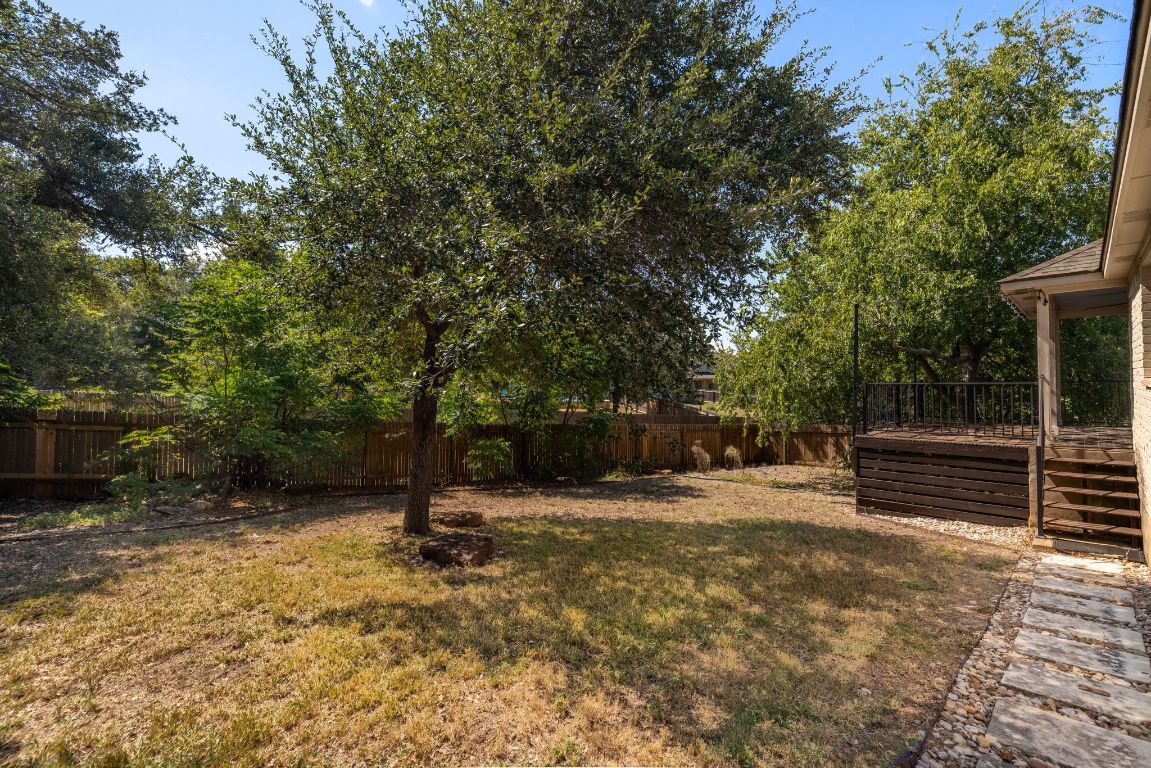 9324 Muskberry Cove Austin, TX 78717 - Photo 24 of 26 a view of outdoor space with deck and tree