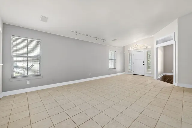 a view of an empty room with window