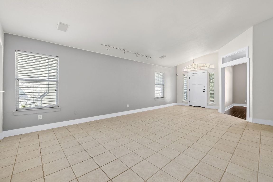 9324 Muskberry Cove Austin, TX 78717 - Photo 4 of 26 a view of an empty room with window