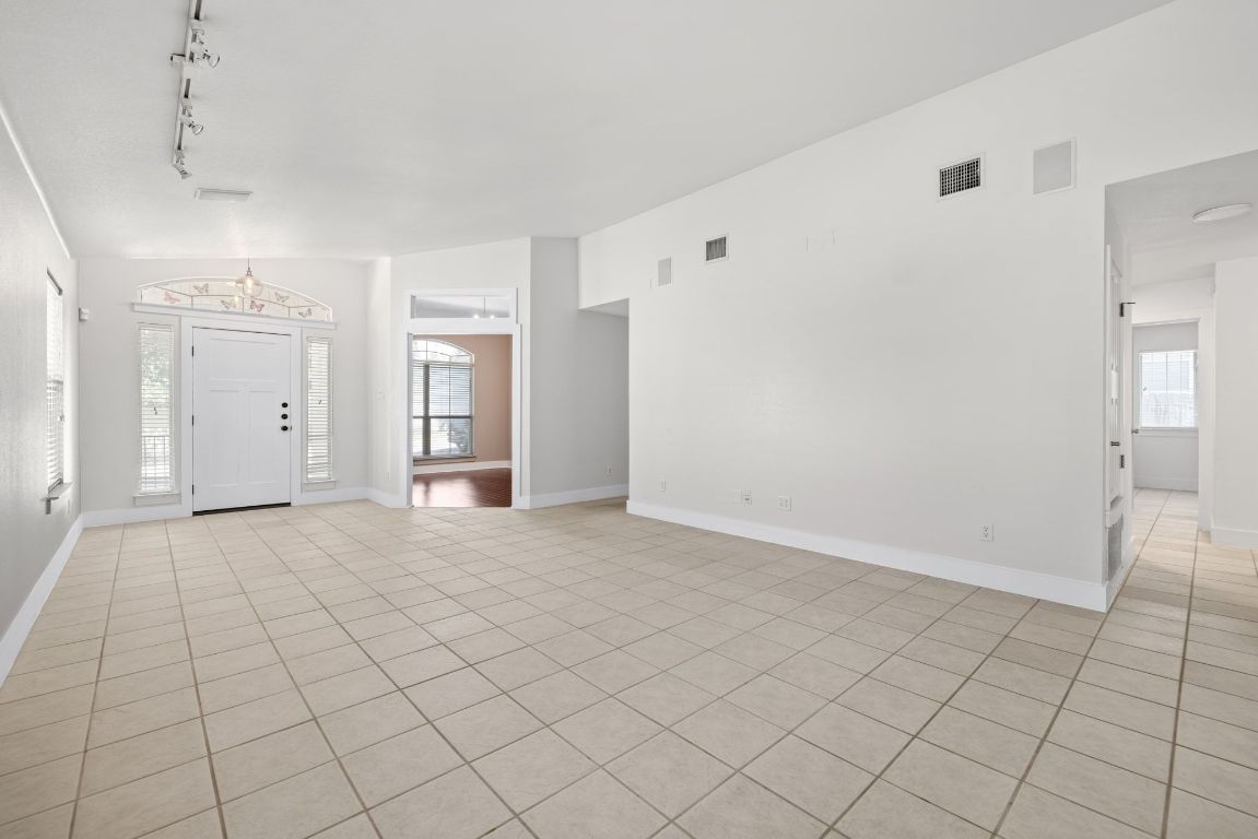 9324 Muskberry Cove Austin, TX 78717 - Photo 5 of 26 a view of an empty room with window