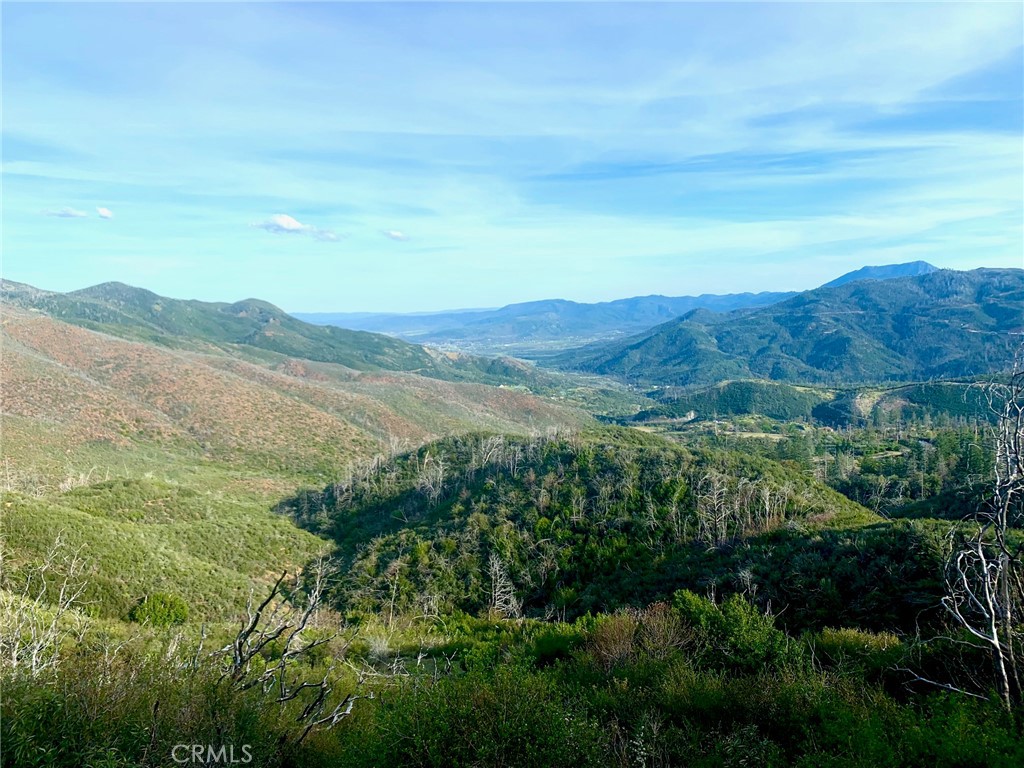 a view of mountain with lake view