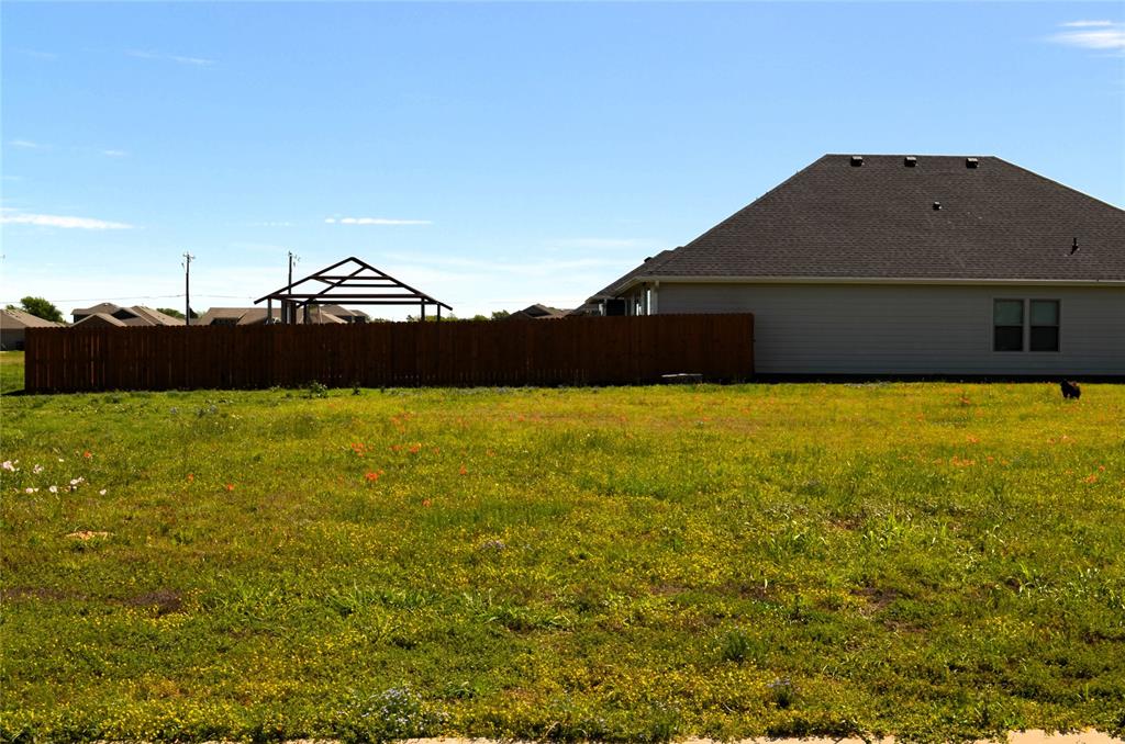 325 Preston Road Mabank, TX 75147 - Photo 1 of 4 a front view of a house with yard and mountain view