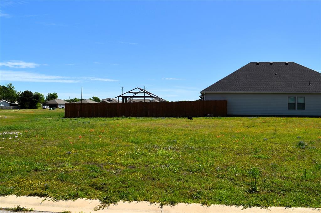325 Preston Road Mabank, TX 75147 - Photo 2 of 4 a front view of a house with a yard