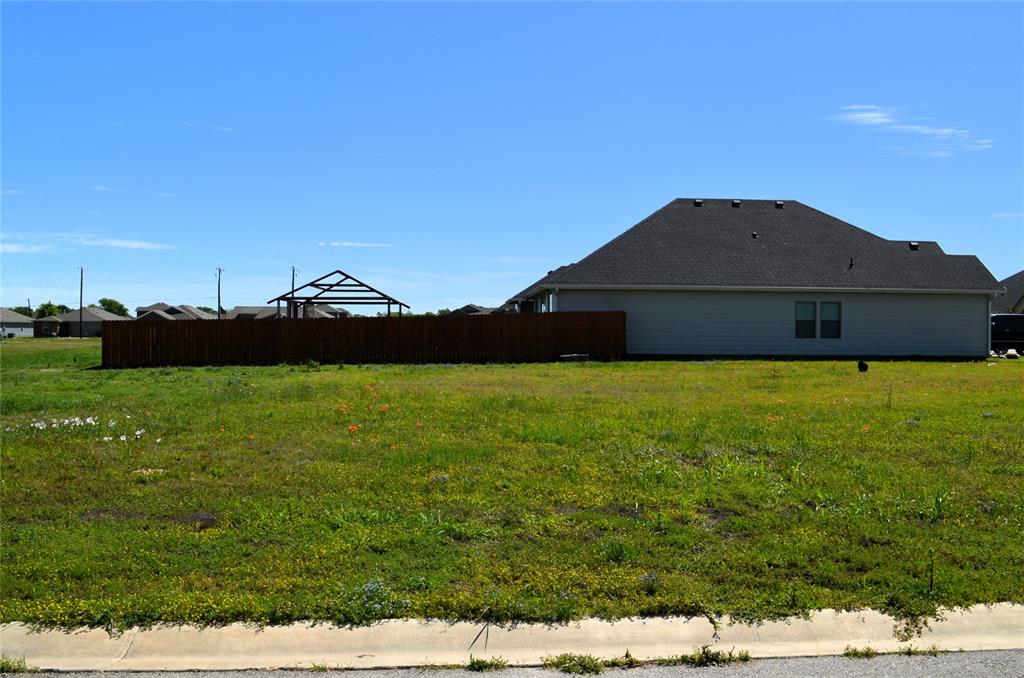 325 Preston Road Mabank, TX 75147 - Photo 3 of 4 a view of a house with a yard