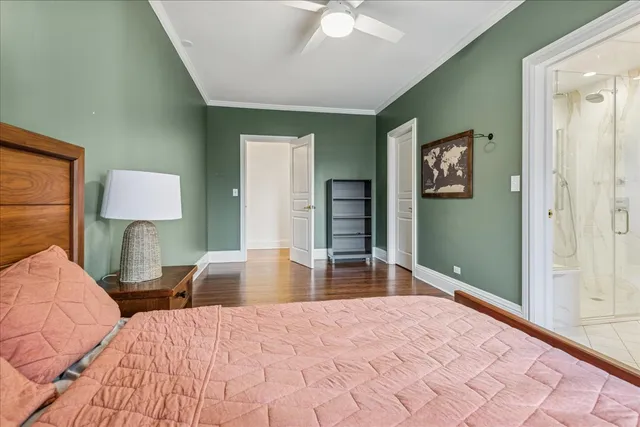 an aerial view of a house with a yard basket ball court and outdoor seating