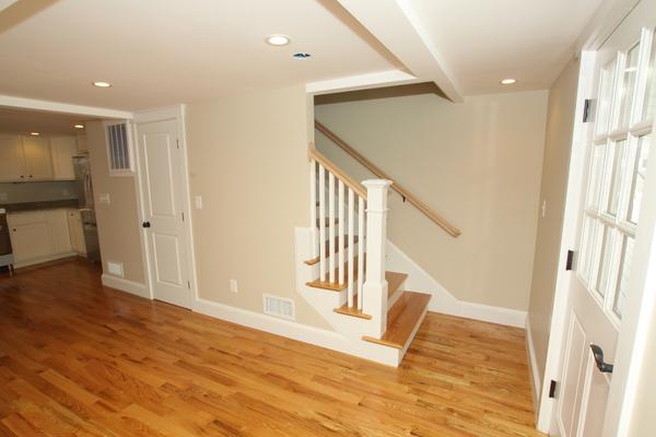 64 Eastern Point Road, Unit 1 Gloucester, MA 01930 - Photo 12 of 30 a view of entryway with wooden floor and stairs