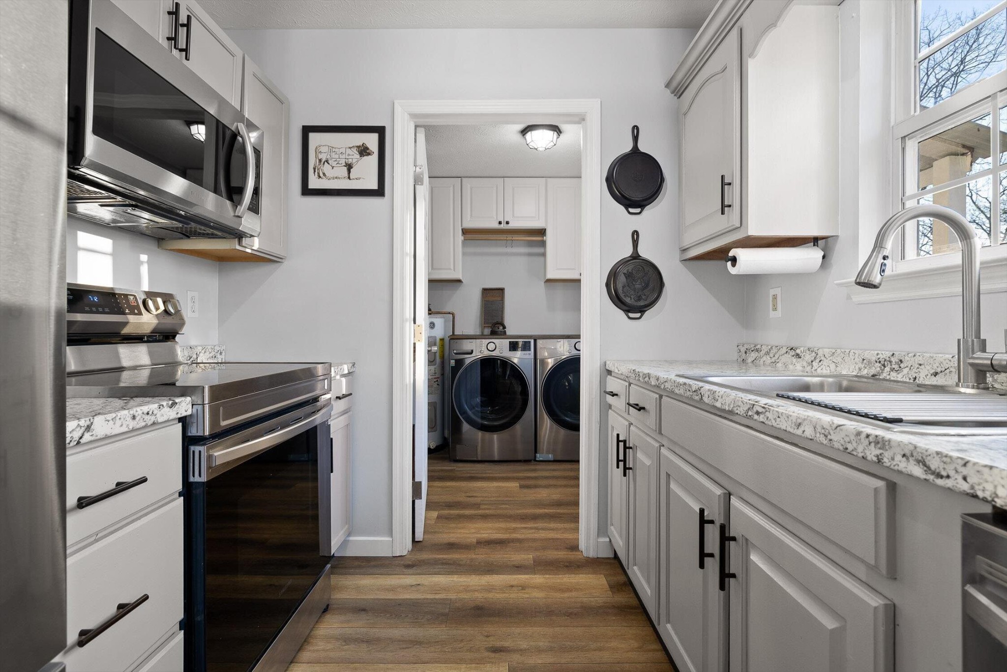 1068 Rogers Road Chickamauga, GA 30707 - Photo 13 of 68 a kitchen with a sink and a stove