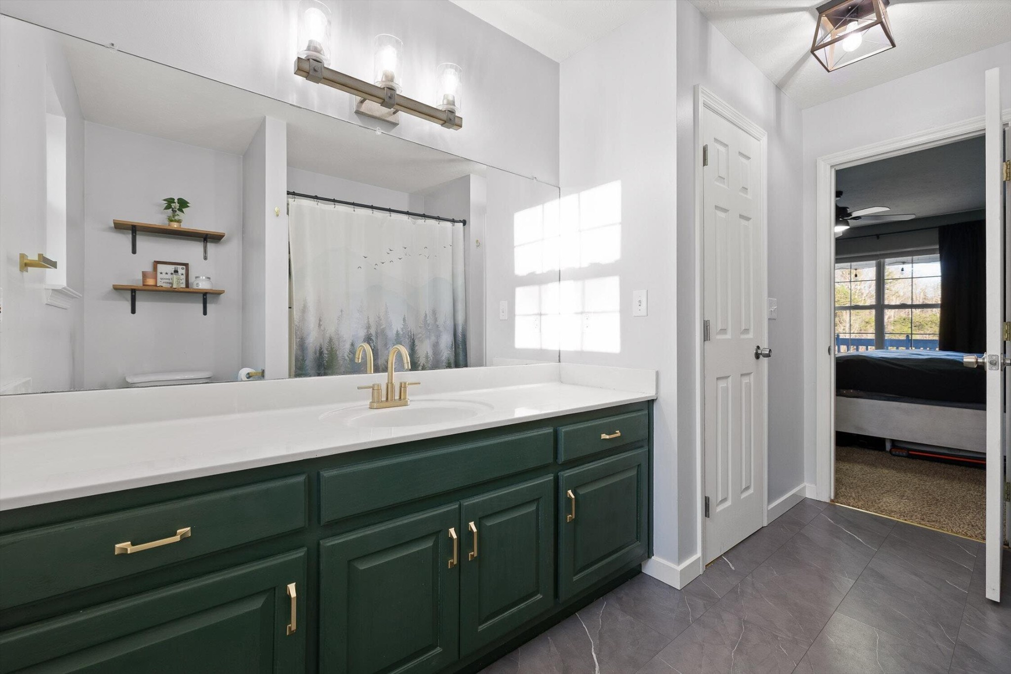 1068 Rogers Road Chickamauga, GA 30707 - Photo 18 of 68 a bathroom with a sink double vanity and a mirror