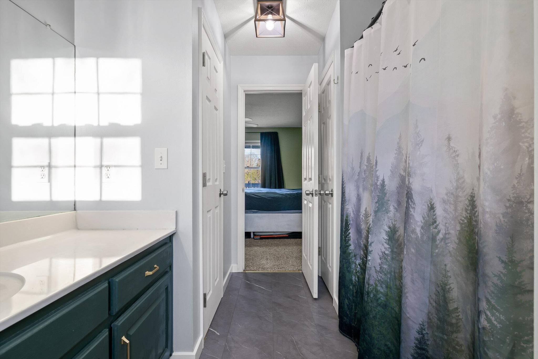 1068 Rogers Road Chickamauga, GA 30707 - Photo 19 of 68 a bathroom with a sink and a mirror
