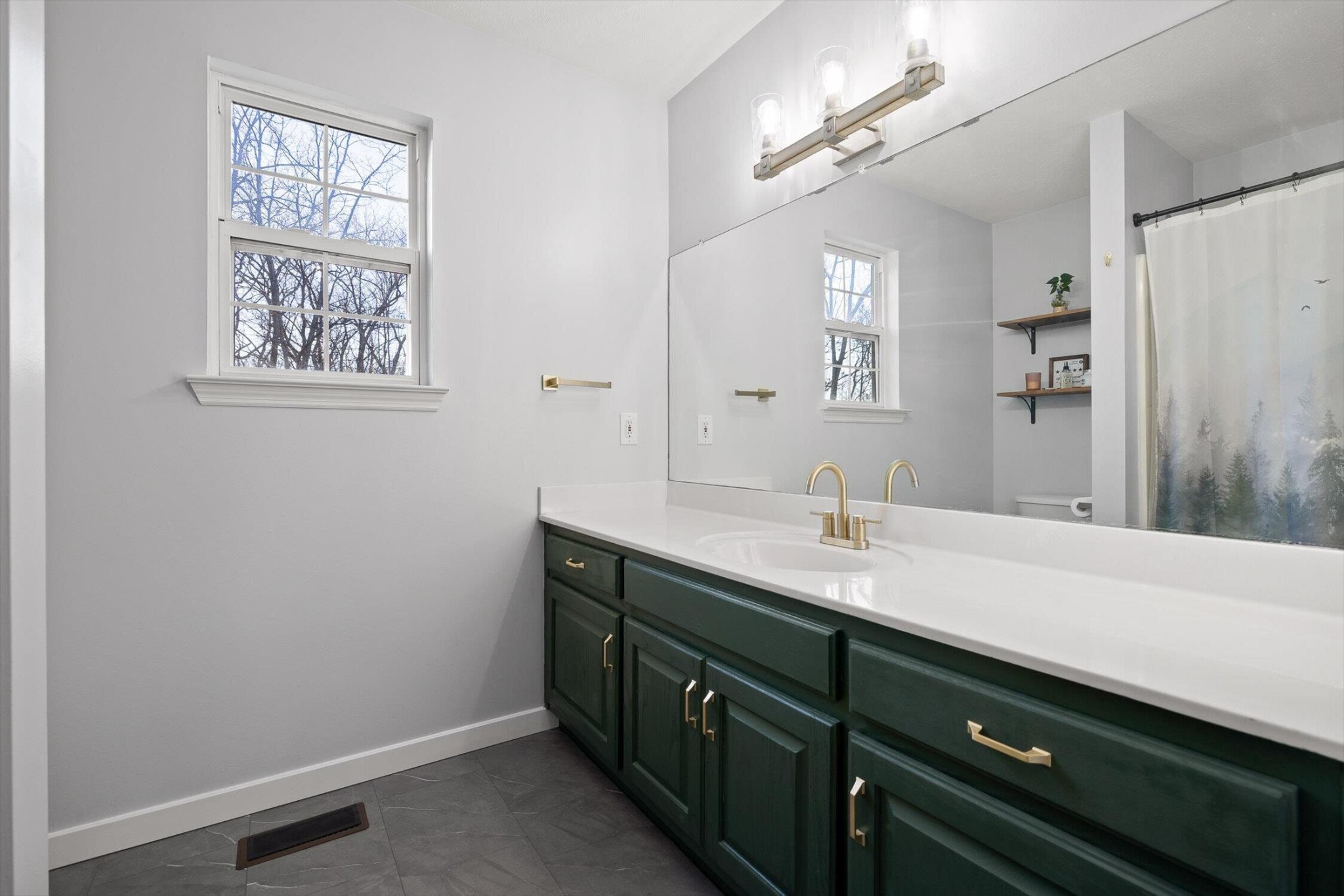 1068 Rogers Road Chickamauga, GA 30707 - Photo 21 of 68 a bathroom with a sink a vanity and a mirror