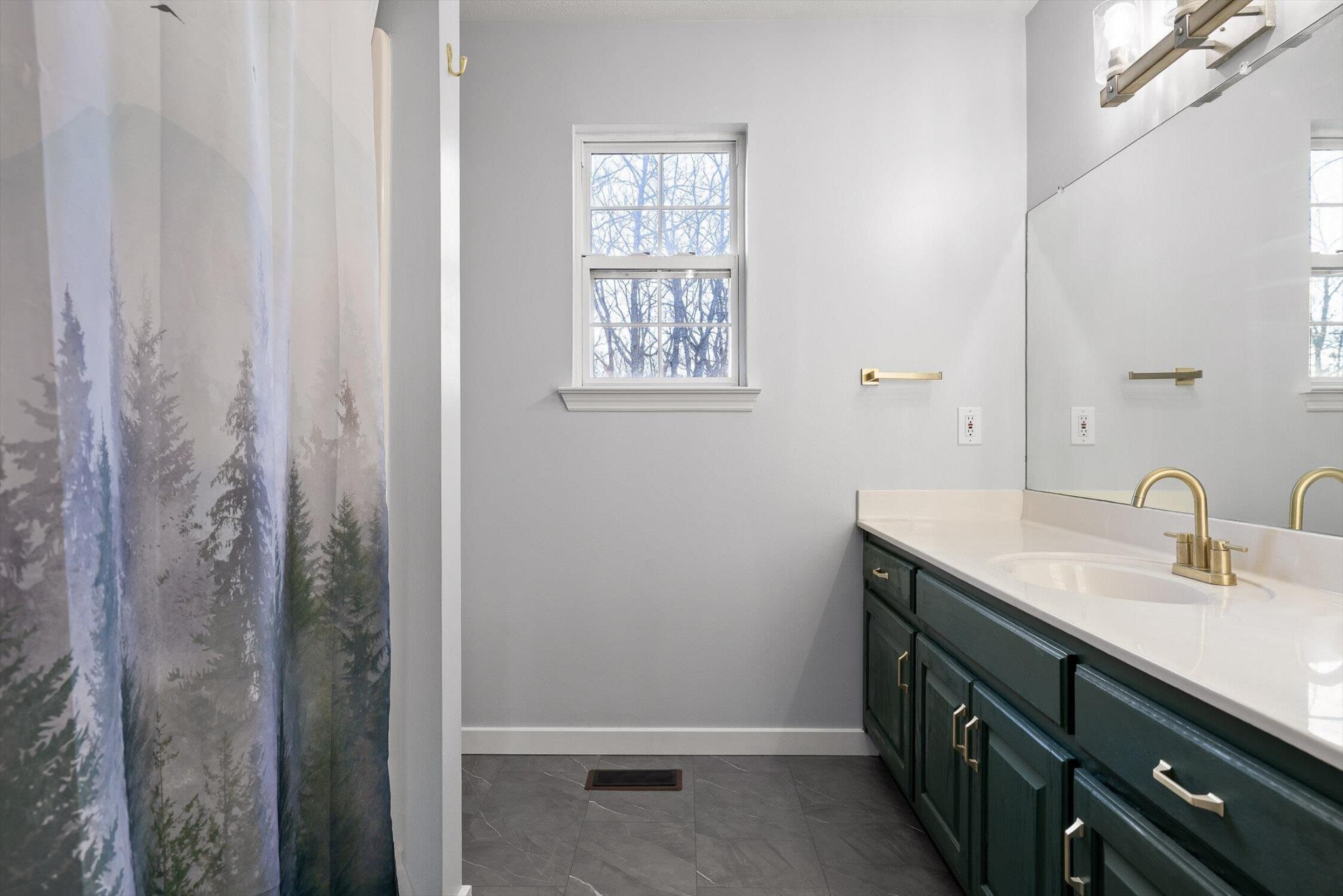 1068 Rogers Road Chickamauga, GA 30707 - Photo 22 of 68 a bathroom with a granite countertop sink and a mirror
