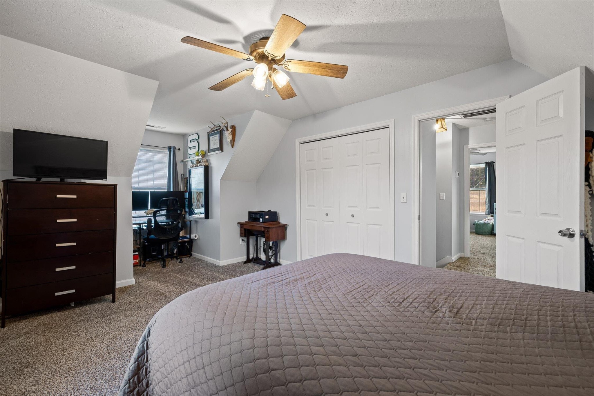 1068 Rogers Road Chickamauga, GA 30707 - Photo 24 of 68 a bedroom with a bed and a flat tv screen on dresser