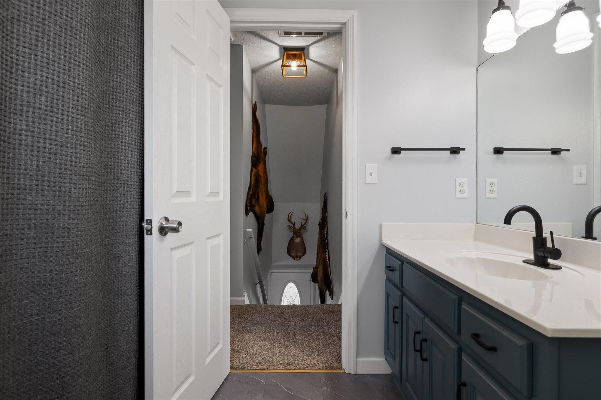 1068 Rogers Road Chickamauga, GA 30707 - Photo 26 of 68 a bathroom with a sink and a mirror