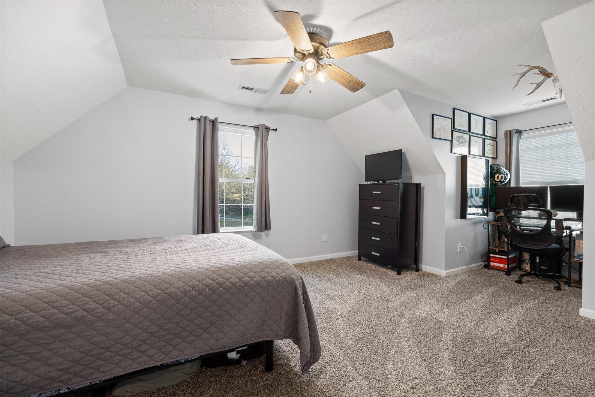 1068 Rogers Road Chickamauga, GA 30707 - Photo 29 of 68 a bedroom with a bed and a tv