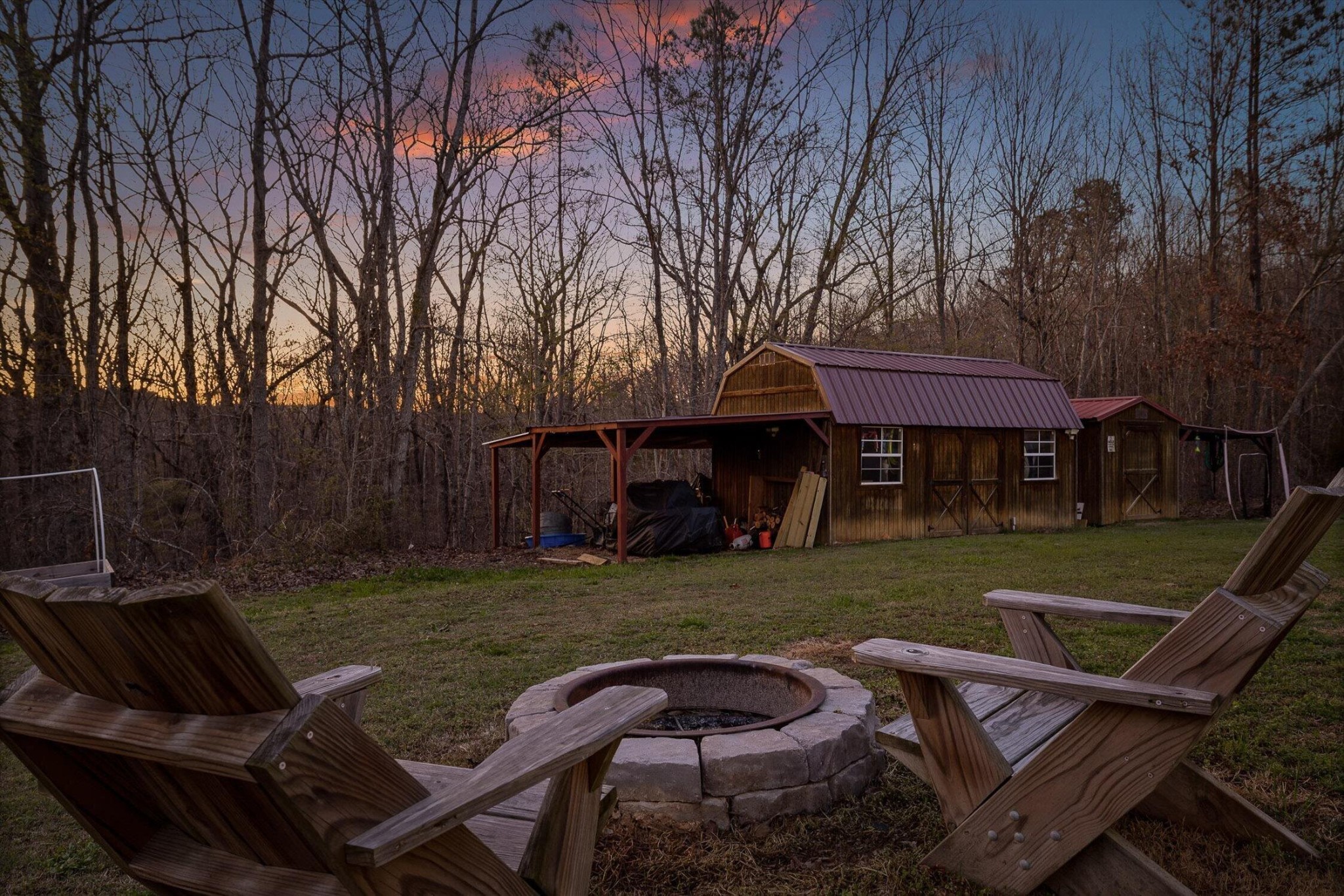 1068 Rogers Road Chickamauga, GA 30707 - Photo 36 of 68 a view of backyard with seating area and trees