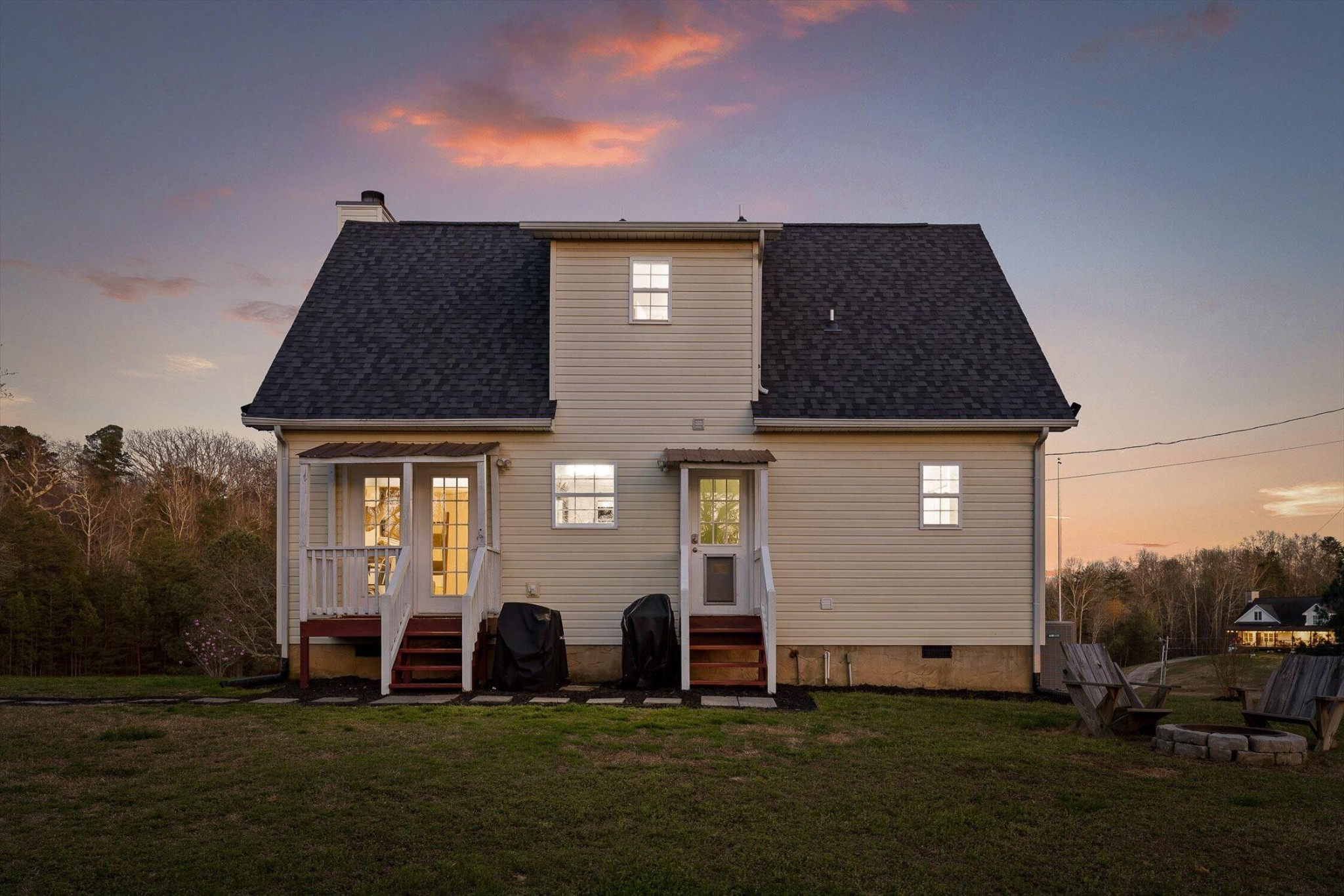 1068 Rogers Road Chickamauga, GA 30707 - Photo 38 of 68 a front view of a house with a garden