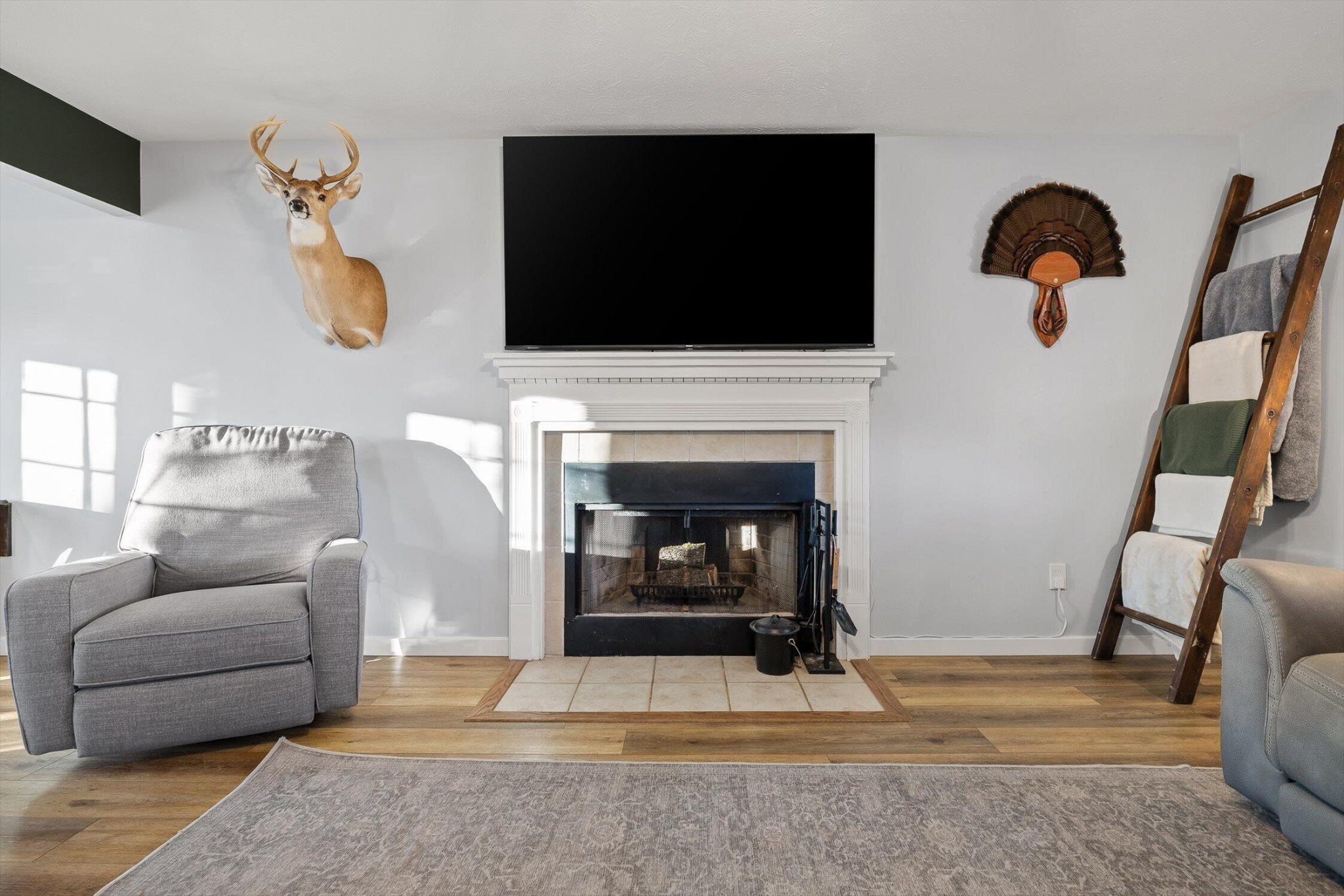 1068 Rogers Road Chickamauga, GA 30707 - Photo 5 of 68 a living room with furniture a fireplace and a flat screen tv