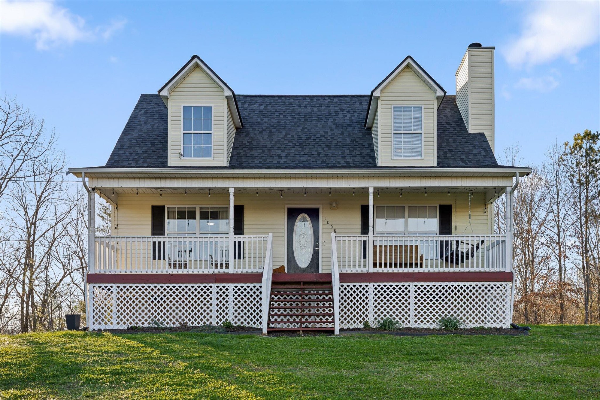 1068 Rogers Road Chickamauga, GA 30707 - Photo 57 of 68 a front view of a house with garden