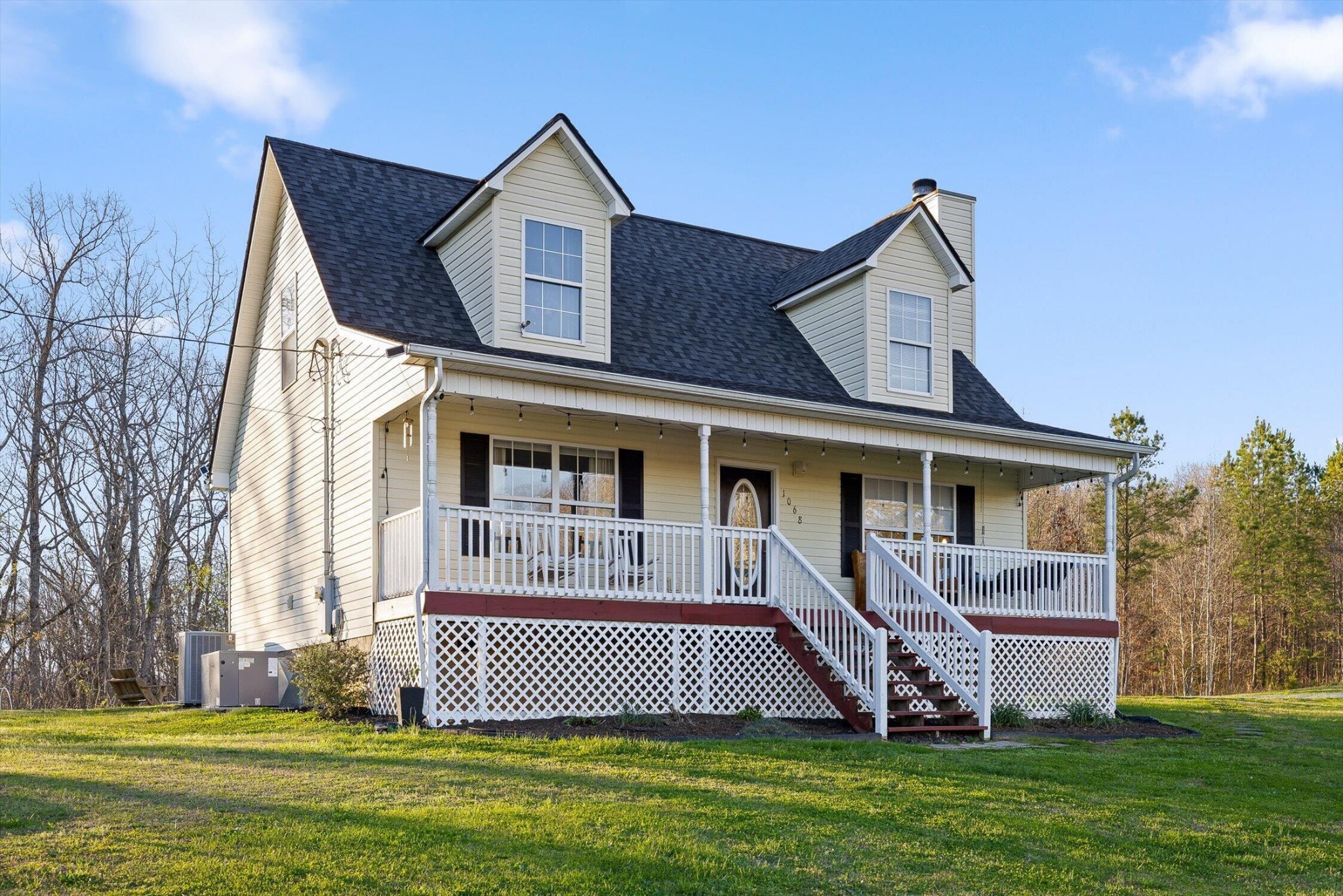 1068 Rogers Road Chickamauga, GA 30707 - Photo 59 of 68 a front view of a house with a yard