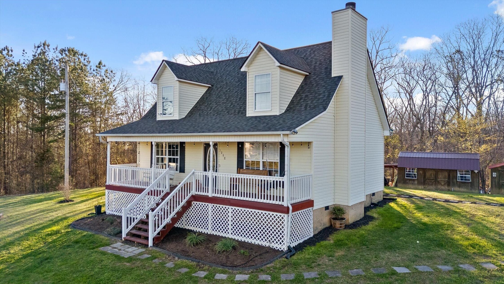 1068 Rogers Road Chickamauga, GA 30707 - Photo 60 of 68 a view of house with a yard and deck