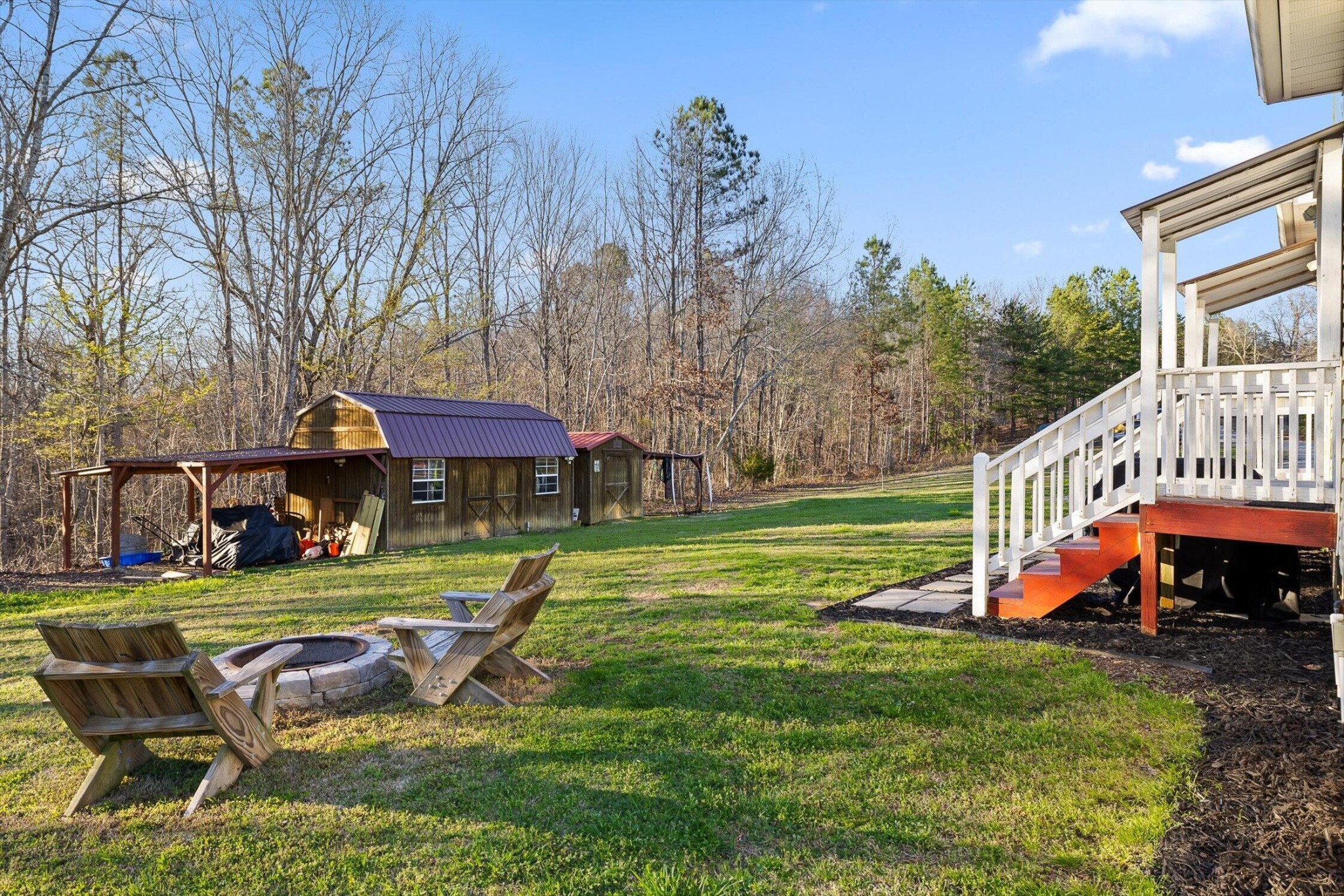 1068 Rogers Road Chickamauga, GA 30707 - Photo 63 of 68 a view of a house with a yard patio and fire pit