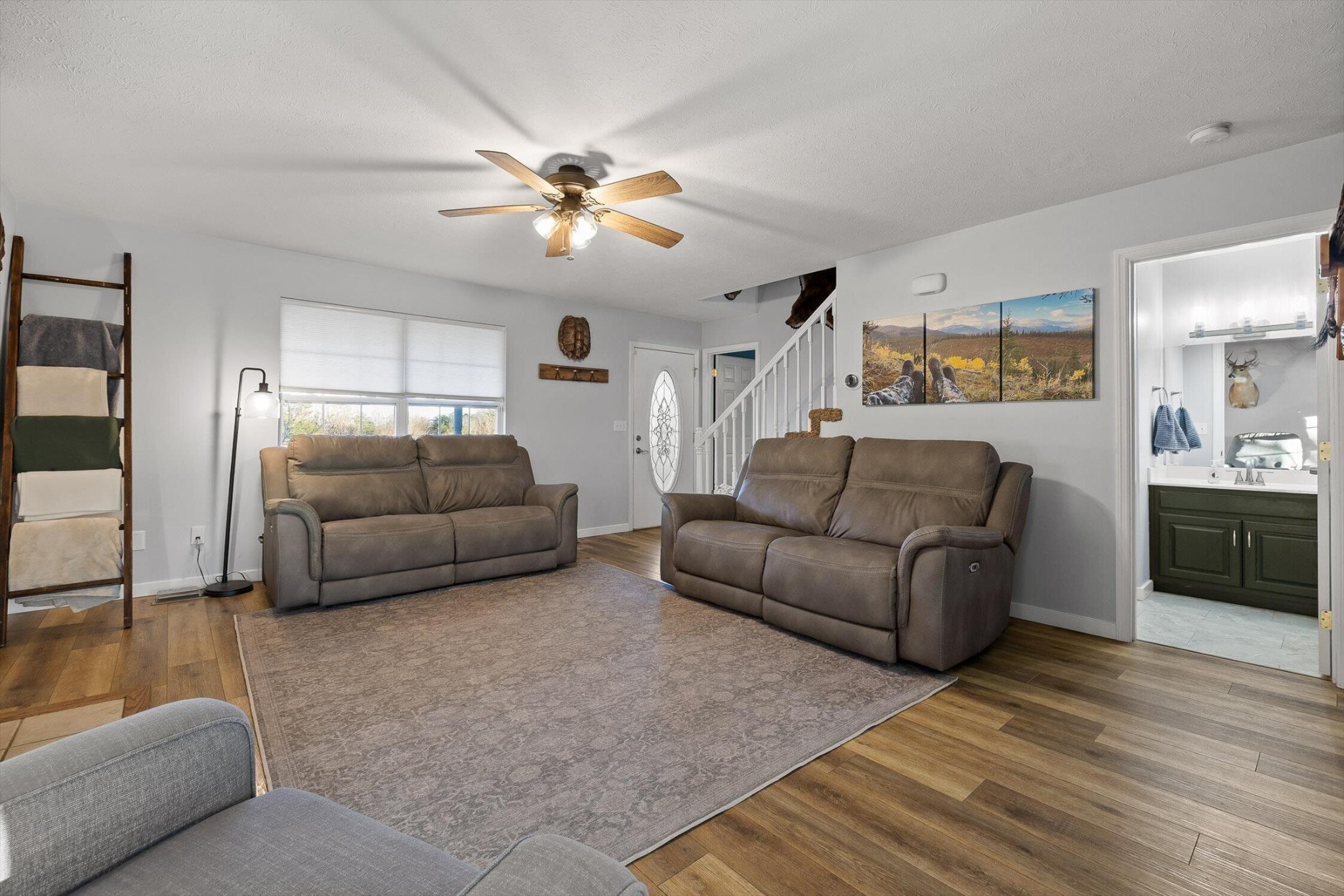 1068 Rogers Road Chickamauga, GA 30707 - Photo 8 of 68 a living room with furniture and a chandelier