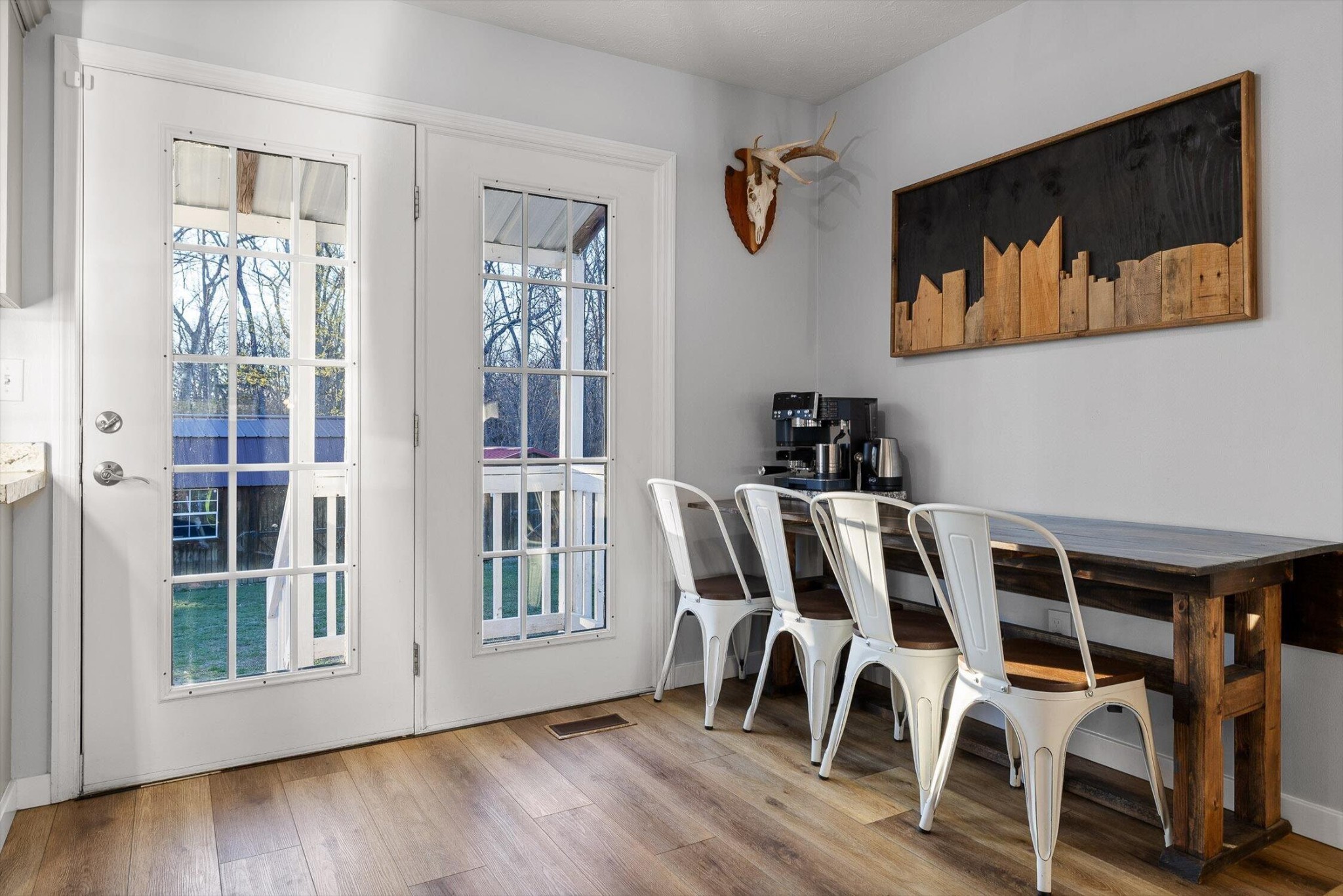 1068 Rogers Road Chickamauga, GA 30707 - Photo 10 of 68 a view of a dining room with furniture wooden floor and front door
