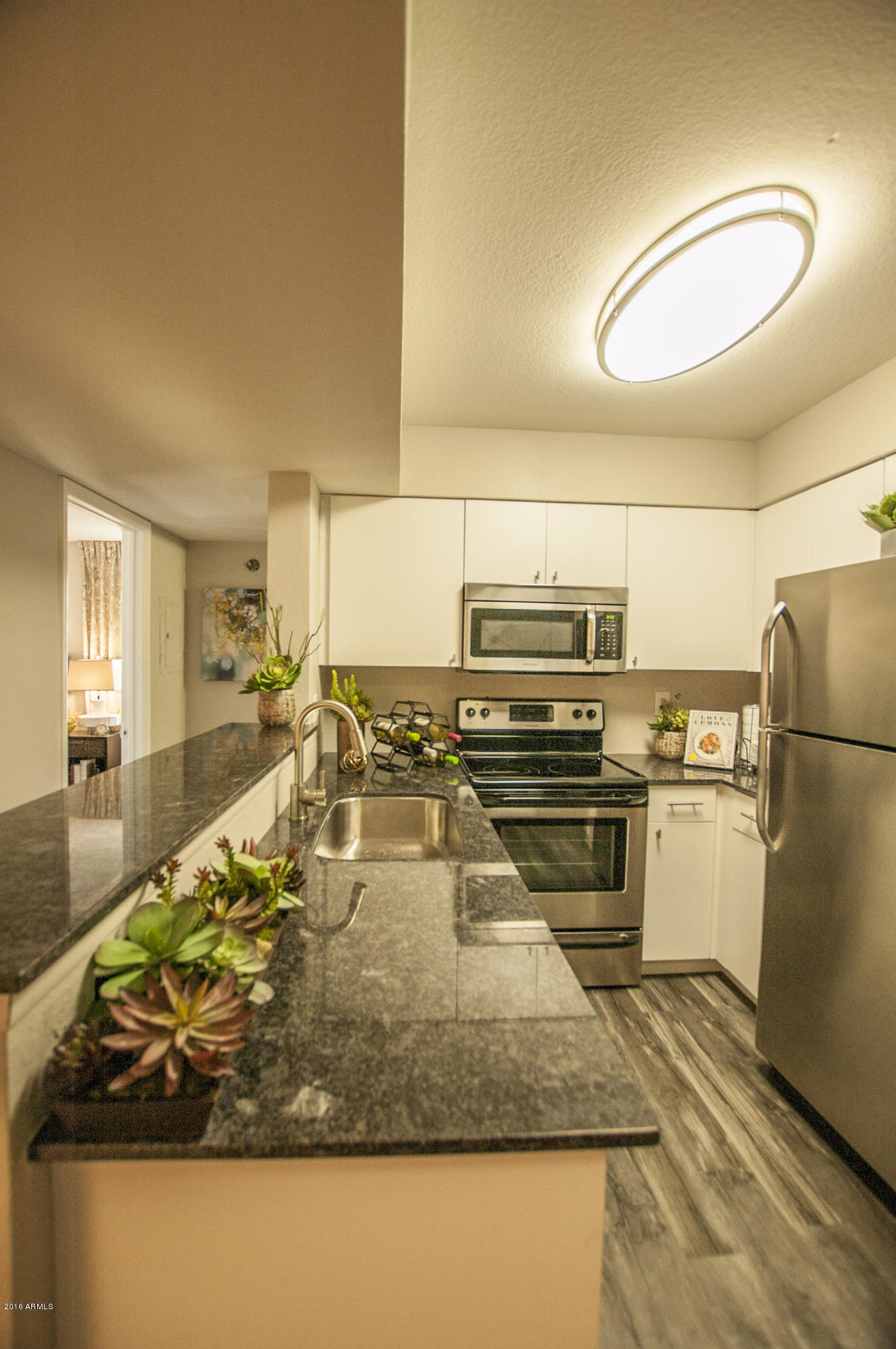 4127 East Indian School Road, Unit 157 Phoenix, AZ 85018 - Photo 8 of 36 Kitchen 4