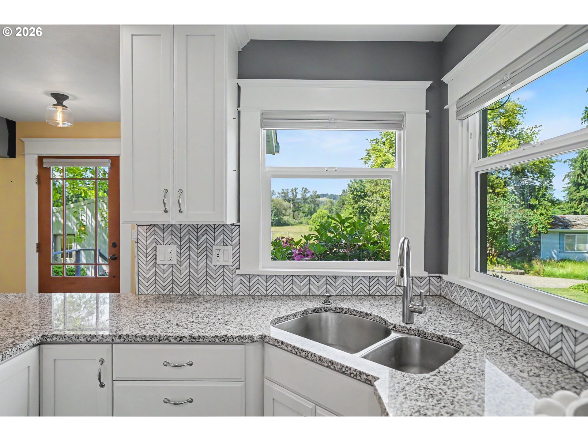 15055 Southeast Foster Road Dayton, OR 97114 - Photo 11 of 47 a kitchen with a sink and a window