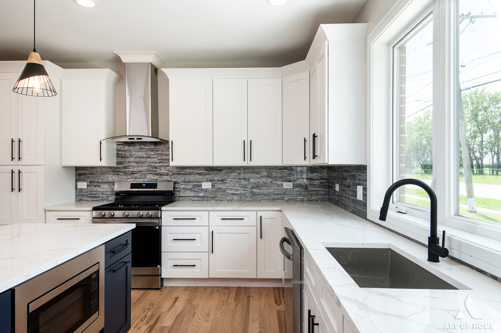 7957 West 73rd Place Bridgeview, IL 60455 - Photo 13 of 40 a kitchen with granite countertop a sink a stove and cabinets