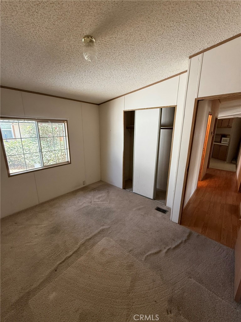 2658 Brougham Drive Oroville, CA 95966 - Photo 12 of 23 a view of empty room with windows