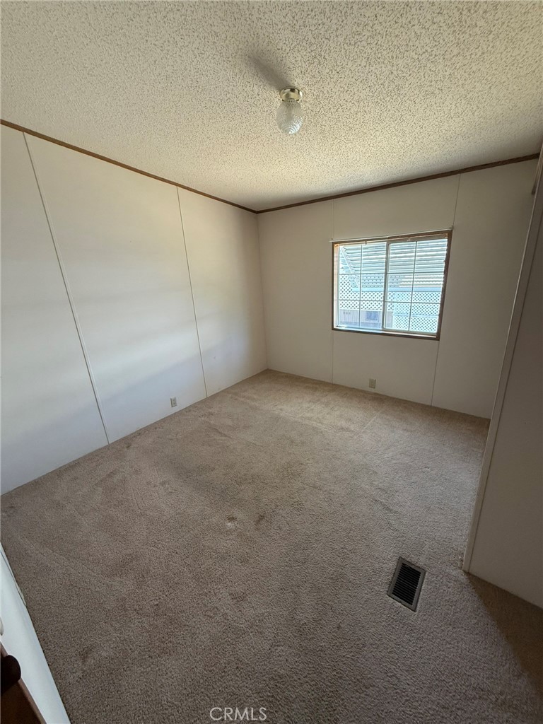 2658 Brougham Drive Oroville, CA 95966 - Photo 17 of 23 an empty room with windows