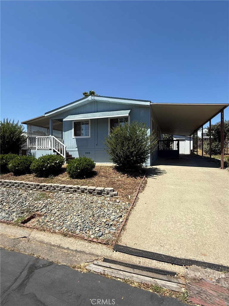 2658 Brougham Drive Oroville, CA 95966 - Photo 2 of 23 a front view of a house with a yard